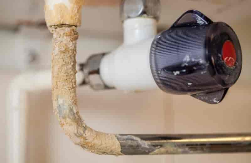 Dealing with Hard Water Issues in Your Plumbing System  cover image - Plumbing manchester - REP